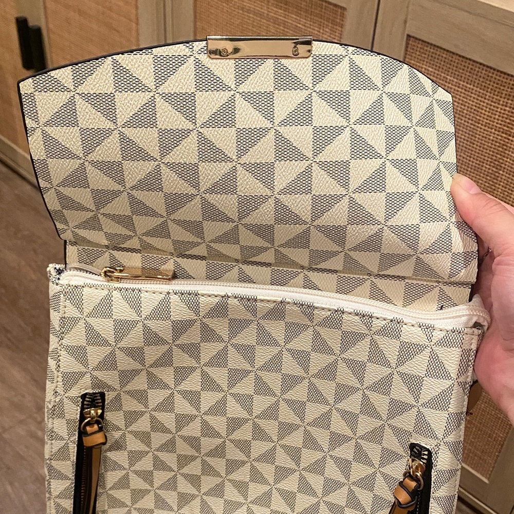 Geometric Patterned Backpack With Tan Straps - image 2